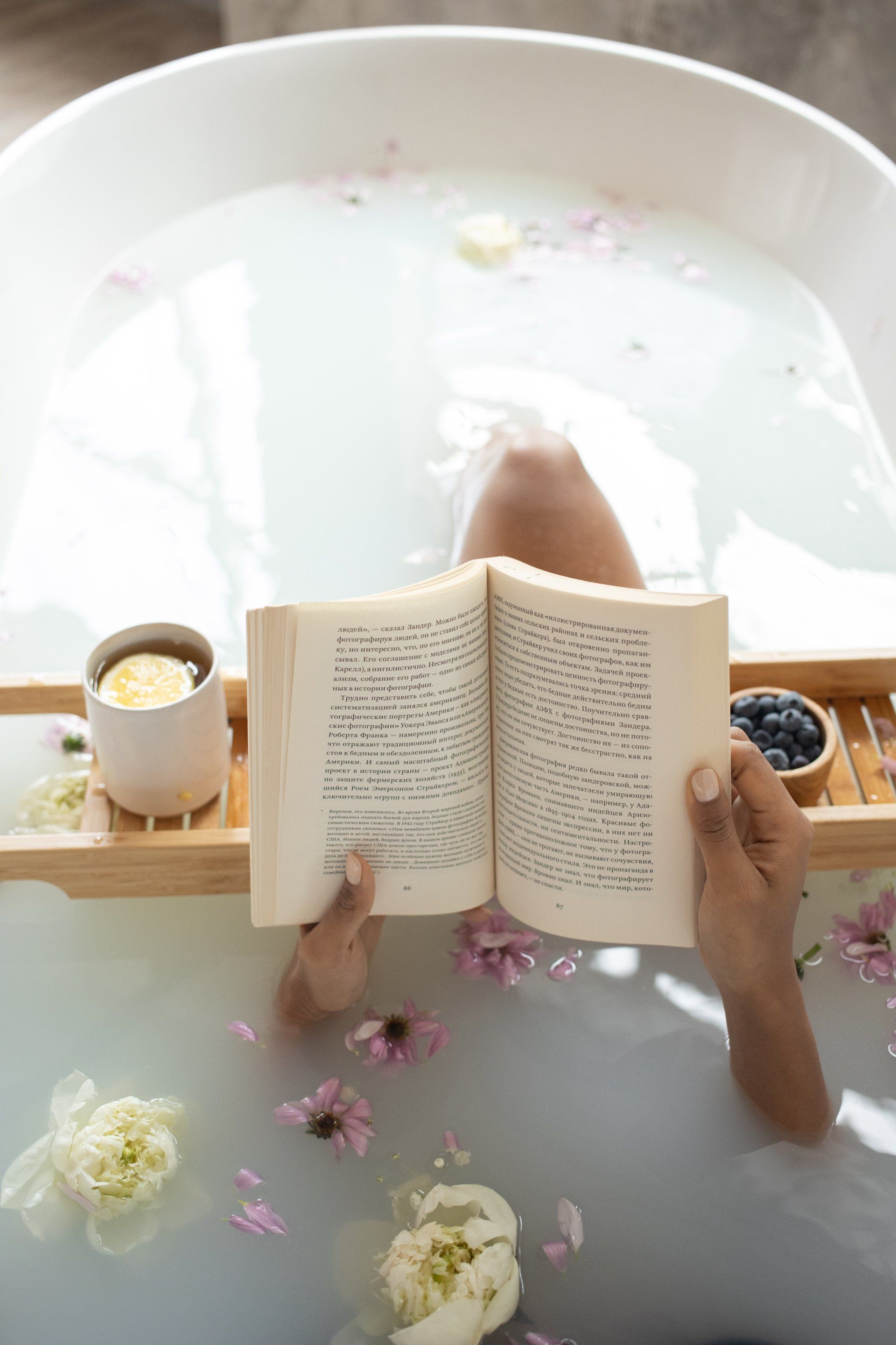 Woman taking bath calming scents
